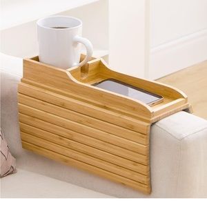 Couch arm rest cup holder